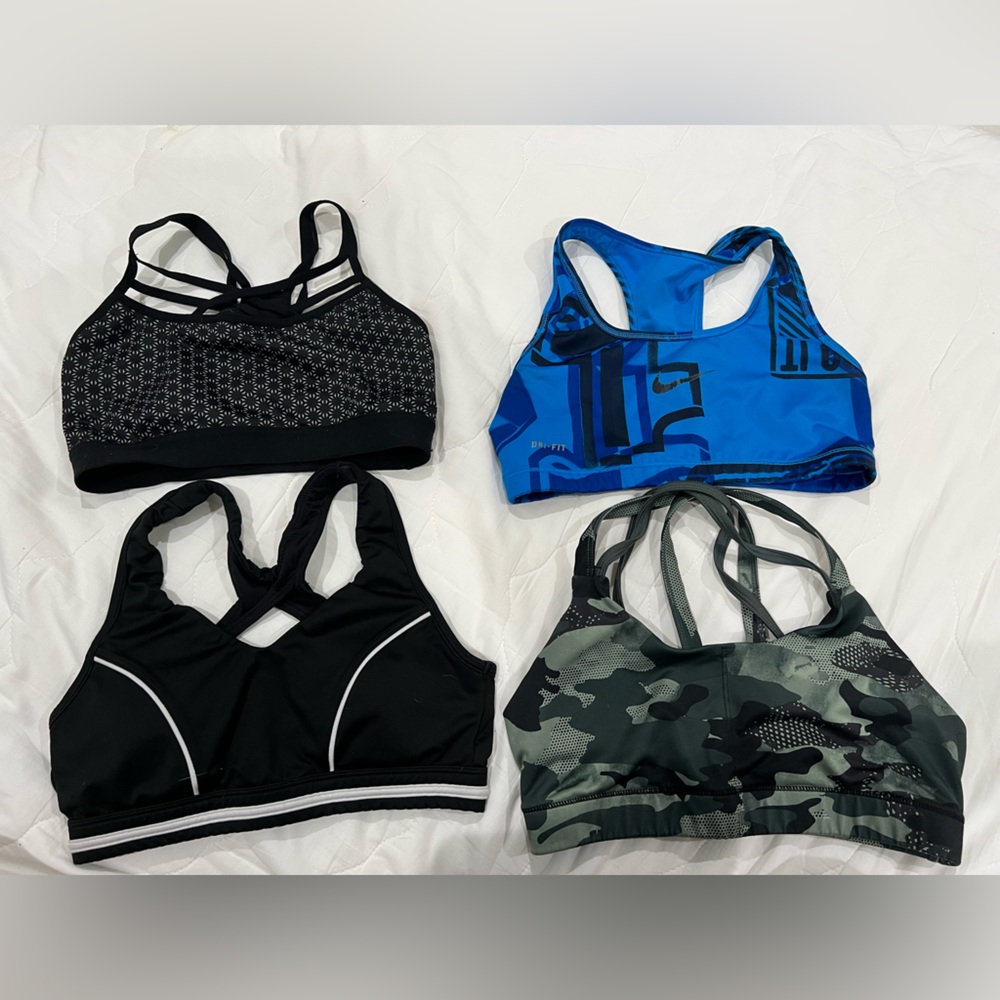 4 sports bra blue Nike Fri-fit, green camo, black, and black pattern
